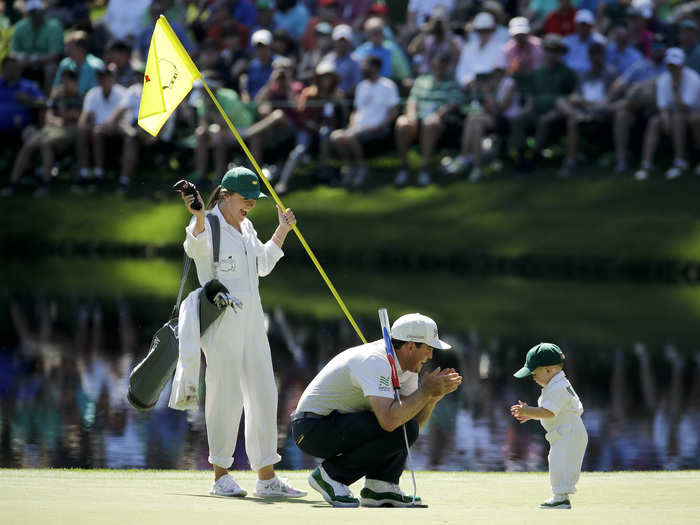 Keegan Bradley cheers his son during the par 3 contest.