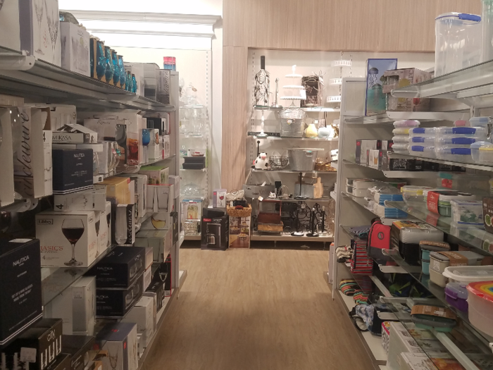 The first part of the store was filled with kitchen supplies. I saw extensive collections of Tupperware …