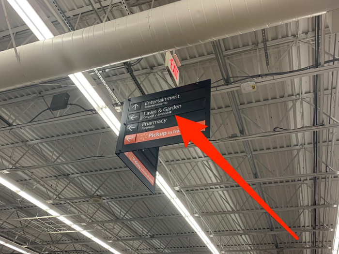 Upon walking into this Walmart, we saw a navigation banner directing customers to the left, toward the lawn and garden section, which we followed ...