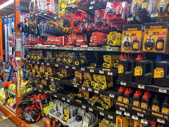 A few aisles over, we found tape measures by brands like DeWalt, Stanley, and the more affordable Anvil.