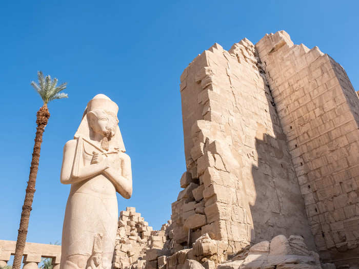 While pharaohs would often demolish the statues or buildings of rules that came before them, this large statue still stands in the complex.