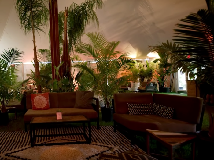 The tent includes plenty of seating for guests to enjoy food and drinks in between shows or during after-parties.