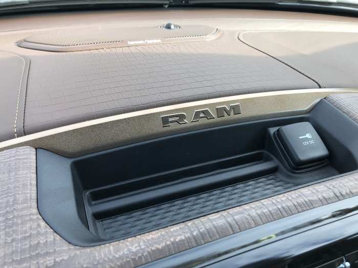 12. The RAM 1500 also has abundant storage, such as this dashboard tray ...