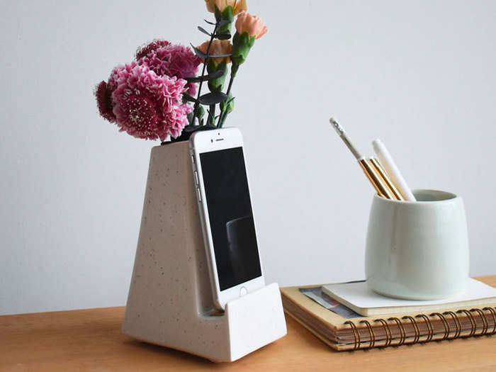 A vase and smartphone holder