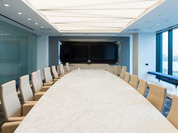 The main board room overlooks the Hudson River and features privacy glass that can be turned opaque during sensitive meetings.