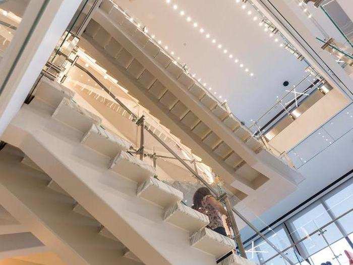 All three floors are accessible via an open staircase that sits towards the center of the office.