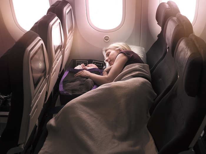 When we researched the seats before our trip, we saw pictures of couples sharing the Skycouch on Air New Zealand