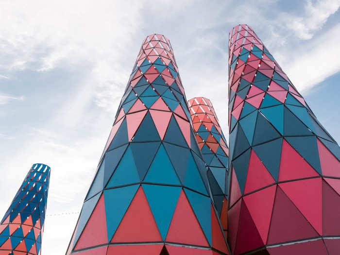 Berlin-based architect Francis Kéré created 12 multicolored towers out of steel and wood. They are modeled after the African baobab tree. "Baobabs have multiple uses as food and medicine. It