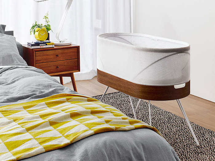 A luxe bassinet that rocks crying babies to sleep