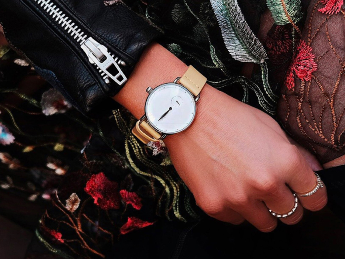 A pale yellow leather strap watch