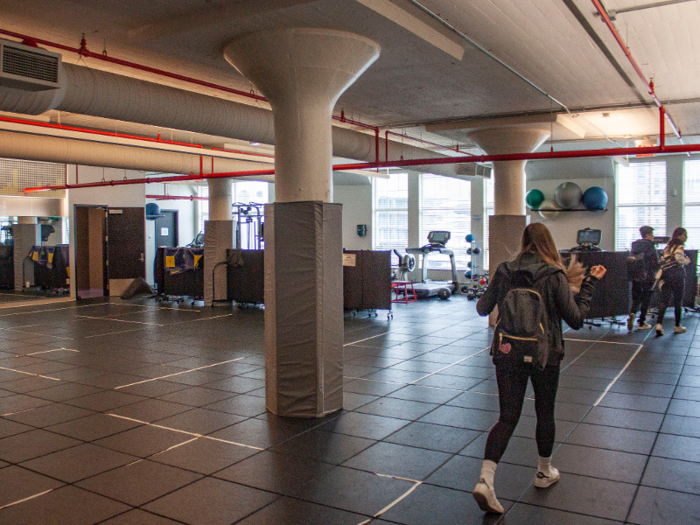 The sports facilities at Avenues include this spacious fitness and weight room.