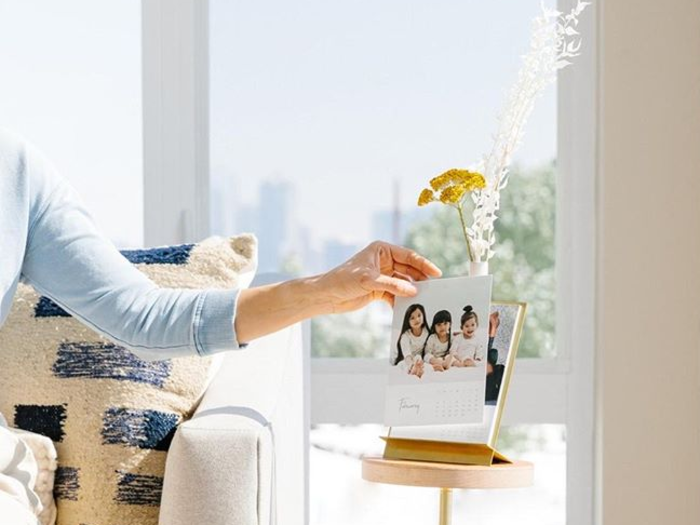 Prints of your favorite moments together, and the pretty stand to display them