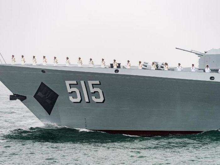 A total of eight advanced Type 054 frigates sailed in the parade.