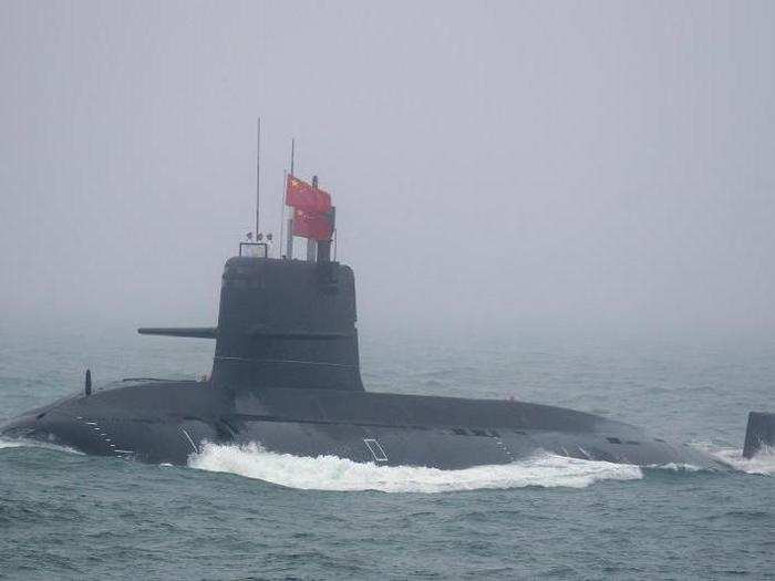 The Jin-class subs were trailed by a handful of diesel-electric submarines, at least one of which was reportedly a new conventionally-armed undersea asset.