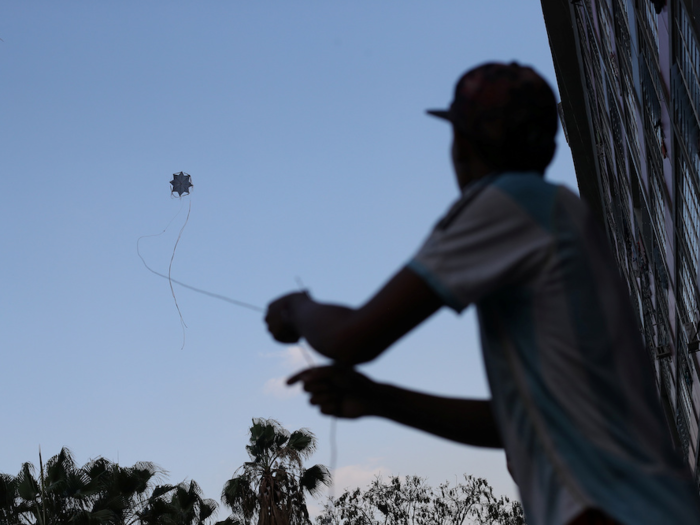 Kids still love to fly kites, like this homemade one.