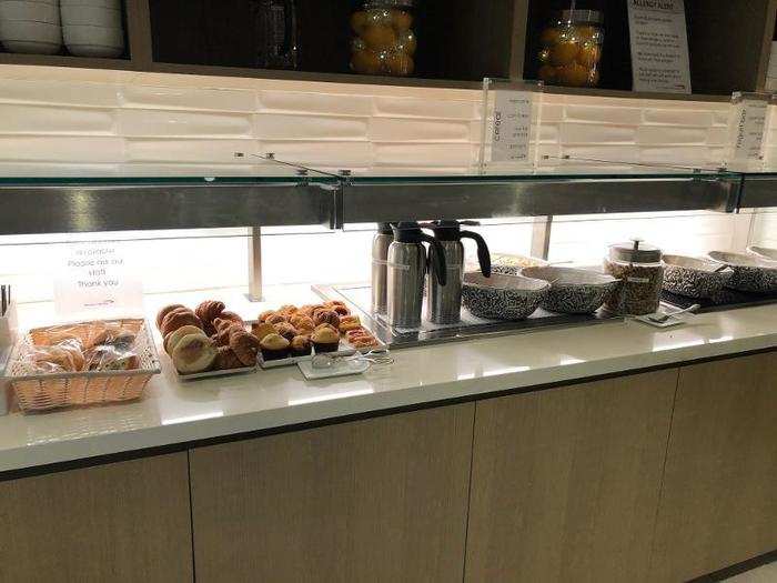 There was a small breakfast buffet station with pastries, cereal fruit, yogurt, and small sandwiches, plus coffee, tea, and other beverages.