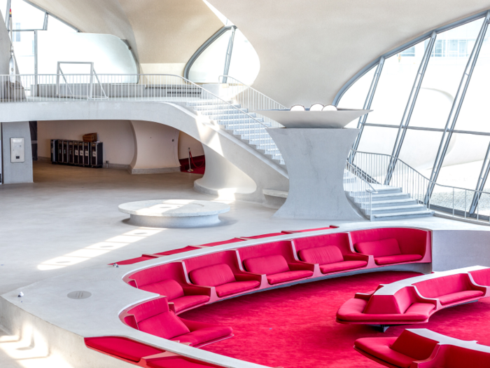 The terminal is famous for its unique architecture and bright red carpeting and seats.