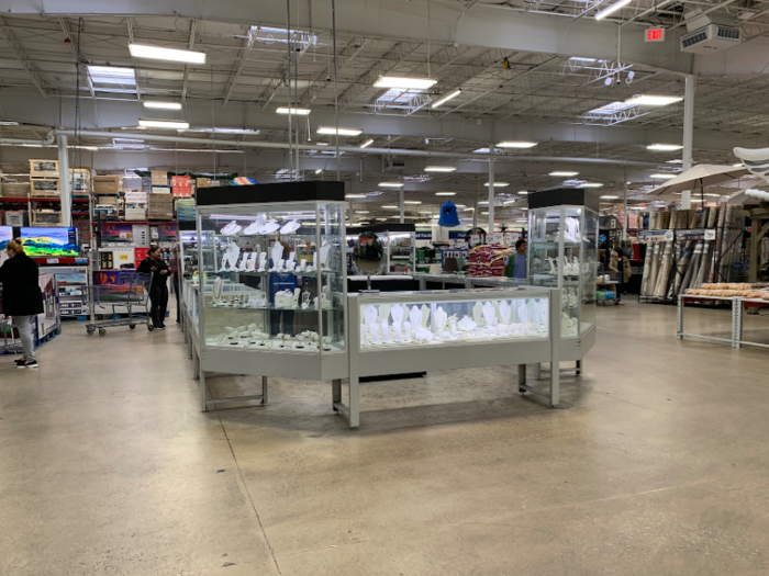 Near the TVs was a jewelry department smack dab in the center, with an assortment of necklaces, bracelets, and engagement rings all kept behind locked glass cases.