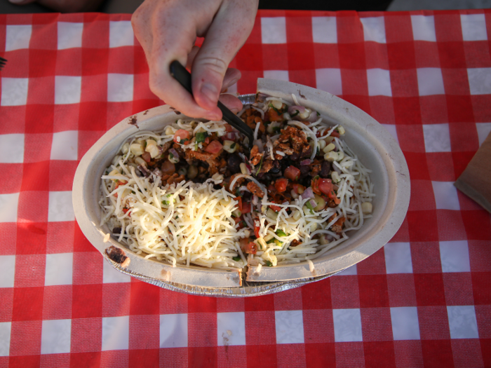 Caught a little off guard, we hastily asked for our toppings. But we goofed and ordered cheese on our bowl, which is not a vegan option at Chipotle.