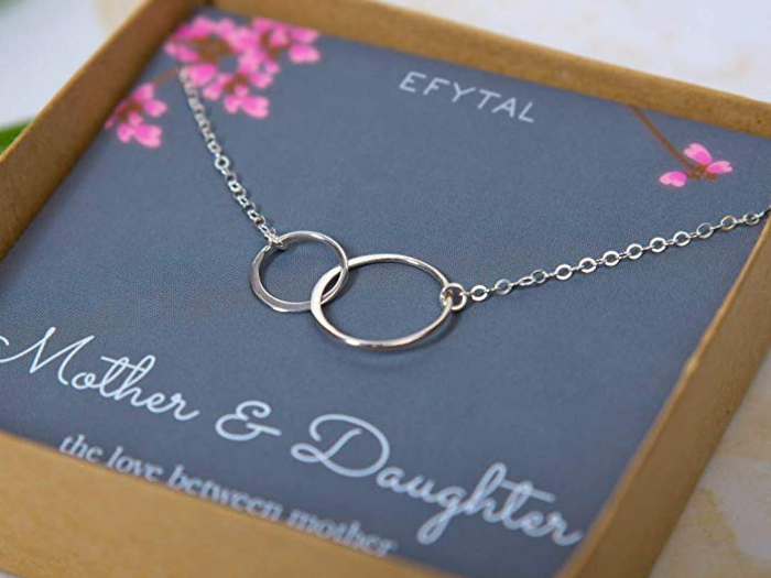 A mother-daughter necklace to stay connected