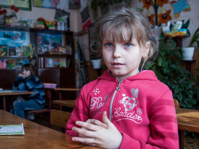 Nine-year-old Olesya Petrova lives in Zalyshany and told the AP that she often goes without lunch. She