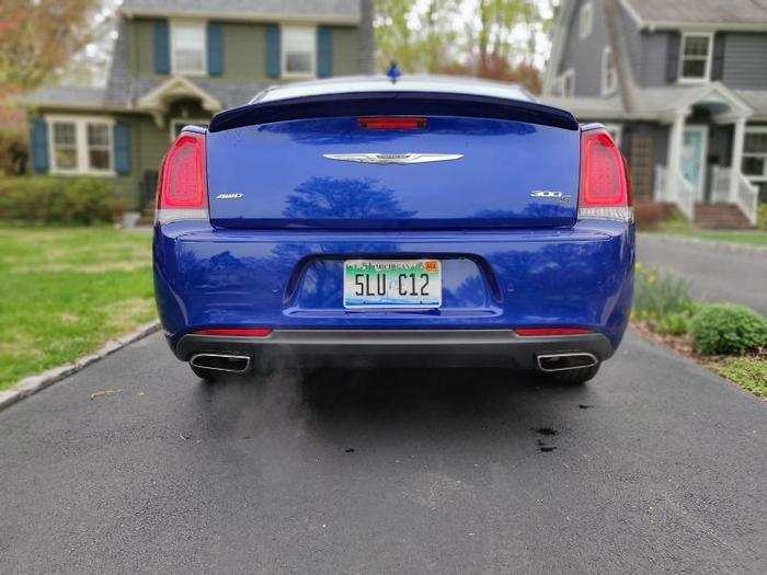 The rear-end is highlighted by vertical taillights and dual exhaust outlets.