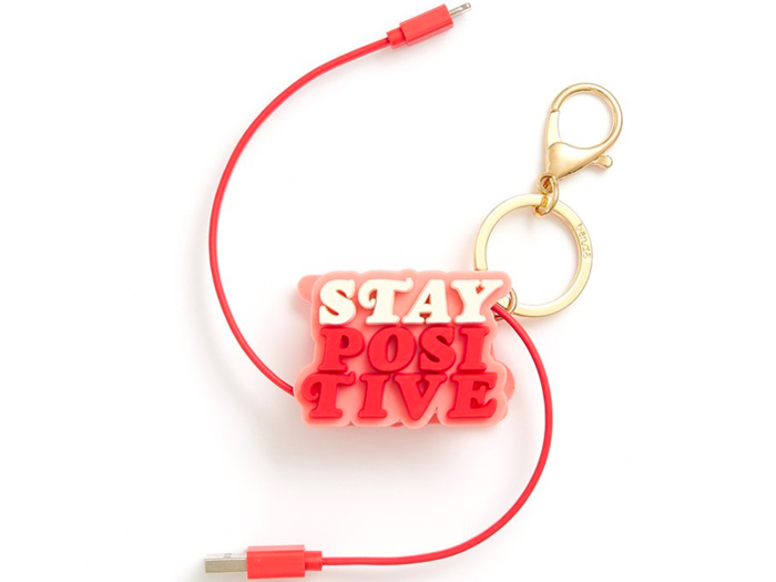 A charging cord keychain with an uplifting reminder