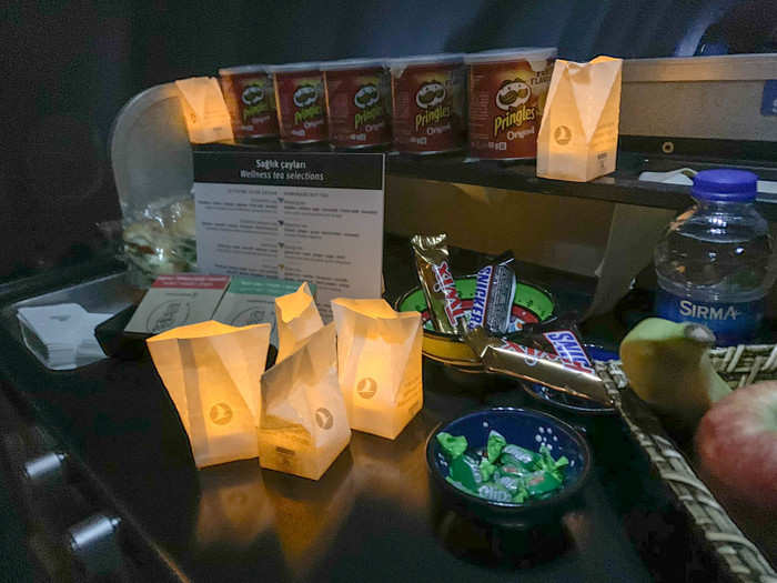 For passengers who got hungry in between meals, there was a snack table set up with chips, candy, fruit, and sandwiches.