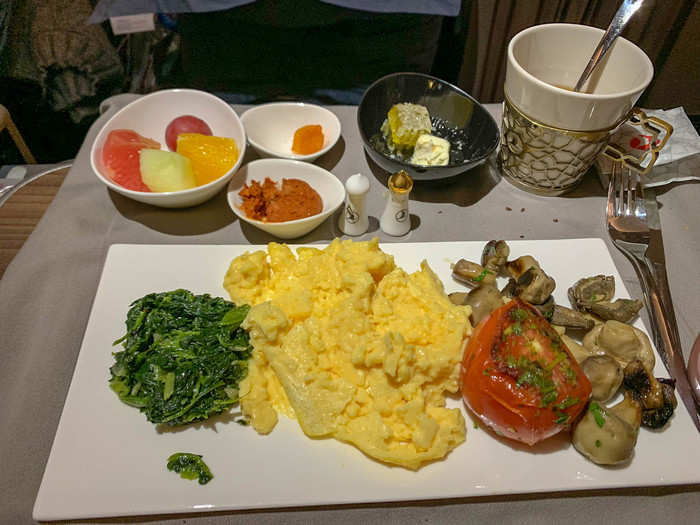 My second flight offered scrambled eggs with sautéed spinach, mushrooms, and tomato. I don