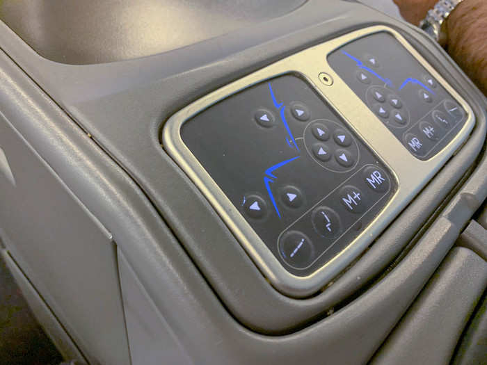 The seat position is controlled by a set of seat controls located on the center console. All seats were 22 inches wide with 78 inches of pitch, with a comfortable lie-flat bed. That