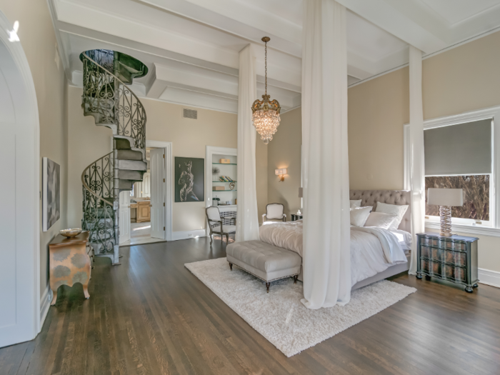 The mansion features eight bedrooms, including a three-room master suite.