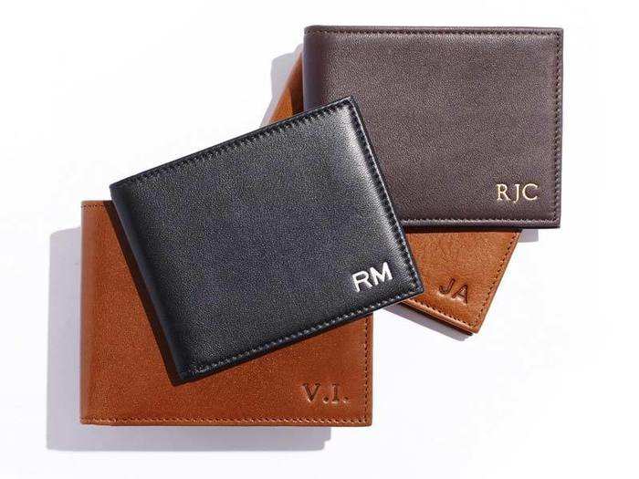 A nice leather wallet, which you can monogram for him