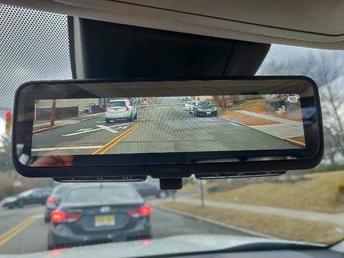 Our test car came with a screen embedded in the rearview mirror that can be turned on or off using a toggle switch at the bottom. The system took a while to get used to but worked like a charm. It