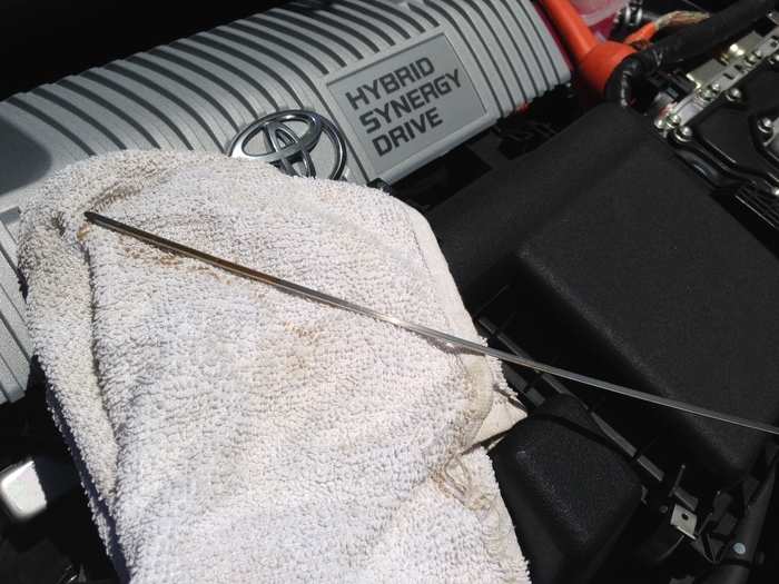 In the days before onboard diagnostics, you learned to check your oil every so often, using the dipstick and a rag. I still practice the ancient art on my Prius.