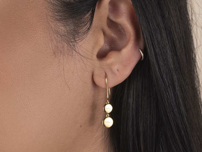 A sophisticated pair of coin earrings