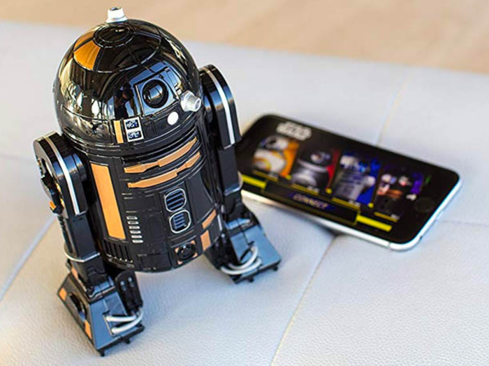 An R2-Q5 droid that can zip around their floor and makes real droid sounds