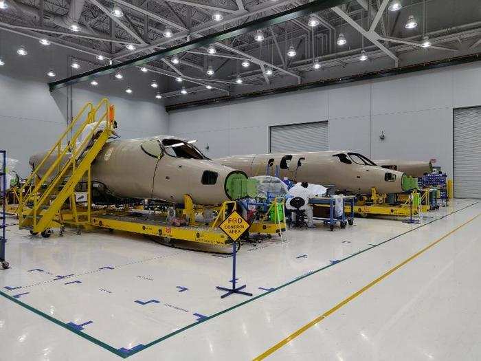 The jet begins the process as carbon composite fuselage shells.