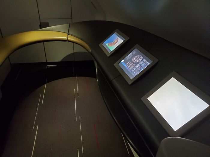 While Emirates and Etihad chose to fit first class showers by the top of the front stairs on their A380s, Air France decided to use the space for a weird screen area. It seemed to feature information on France. I can