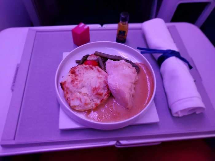 I asked if I could just have the chicken since the fish in the lounge was bad, and after first apologizing and telling me they only had enough plates for the people scheduled to eat on the plane, the flight attendants found me a plate of the chicken! Such service.