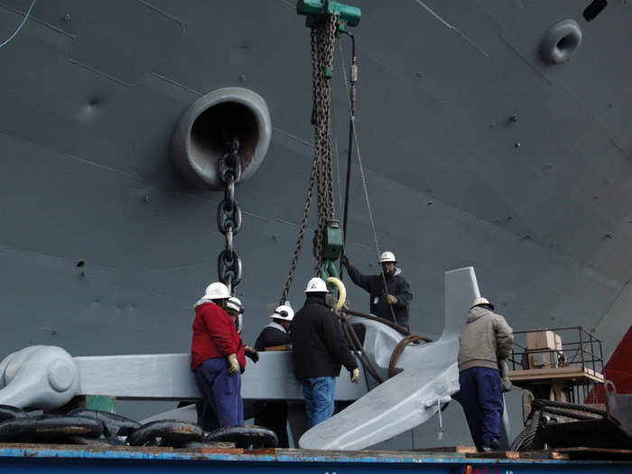 The anchor for a Nimitz-class carrier weighs 60,000 pounds. The chains add another 20,500 pounds.