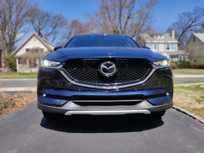 The CX-5 comes standard with safety systems such as dynamic stability control, hill-launch assist, blind-spot monitoring with rear cross-traffic alert, and smart city brake support. Our tester came with optional extras such as adaptive cruise control, lane-departure warning, and lane-keep assist.