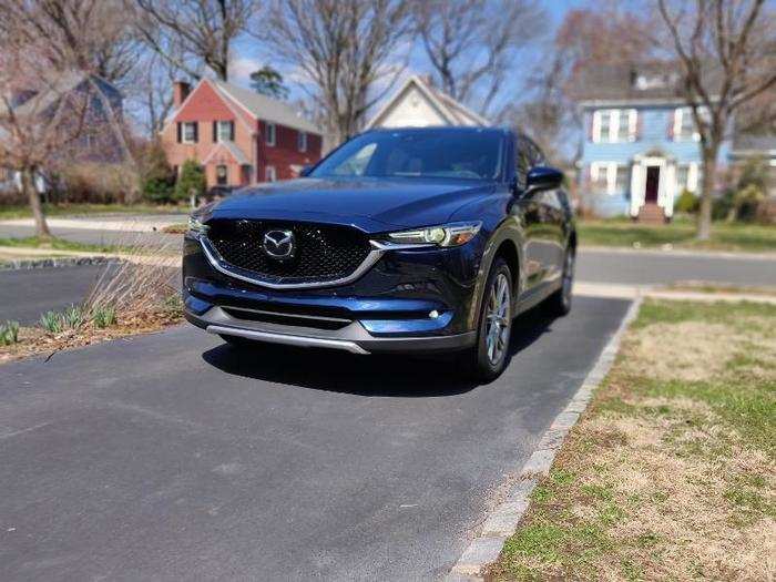 The crossover retains its striking and stylish looks, punctuated by the large Mazda corporate front grille and angular headlights.