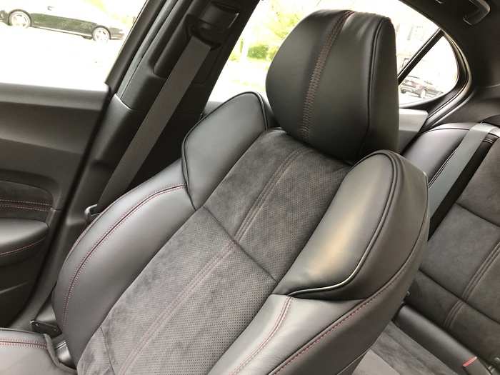 The front seats are wonderful: in the case of our tester, black leather combined with suave Alcantara, and just enough bolstering to grip you when the driving gets frisky. They