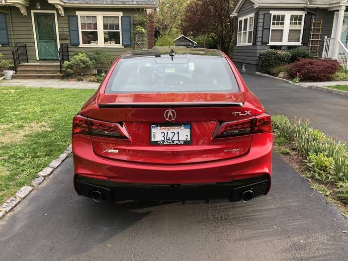 The rear end is beautifully carved, with a sweet decklid spoiler and blacked-out exhaust pipes.