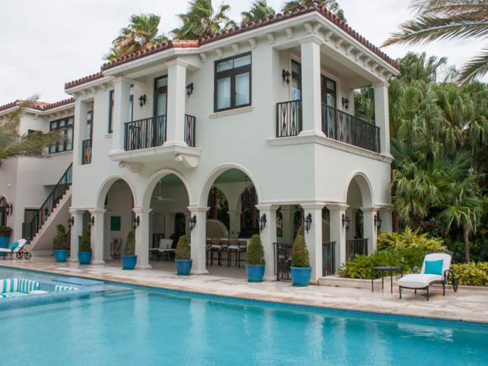 Alongside the pool is a covered cabana for al fresco dining and entertaining.