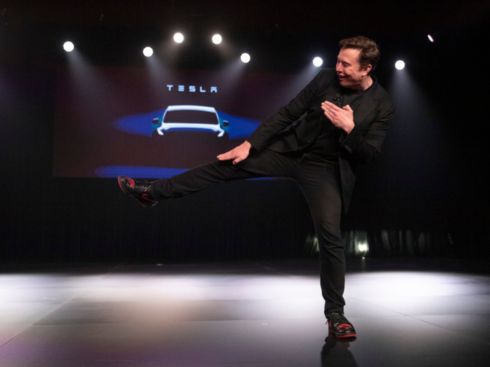 And Elon Musk wore a pair of custom Jordan Is made of black python skin and black hair on hide, according to DM Custom Sneakers.