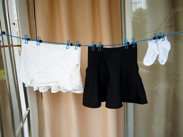 An easy-to-setup clothesline to dry your towels and bathing suits