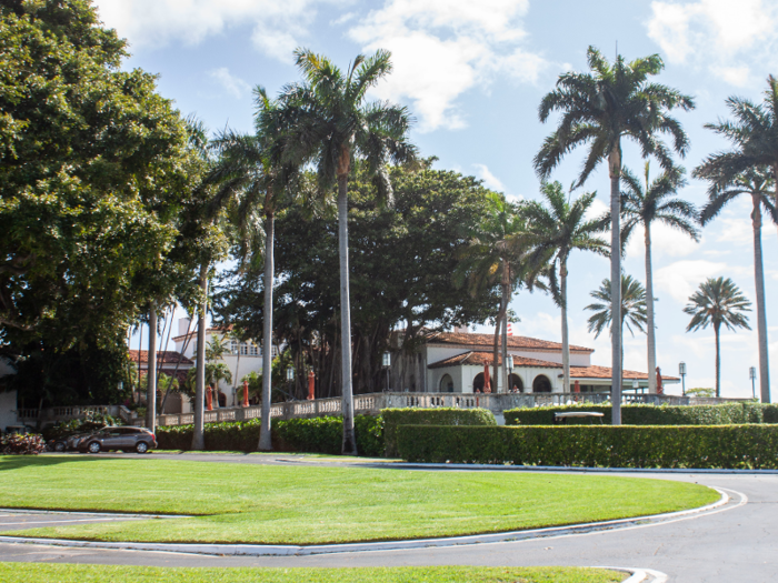 The Indian Creek Country Club, a sprawling Mediterranean-style structure, sits on the island