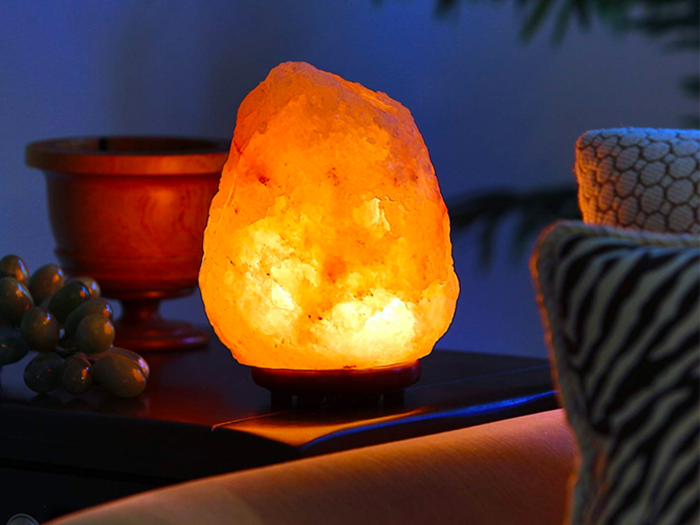 A hand-carved salt lamp for added ambiance