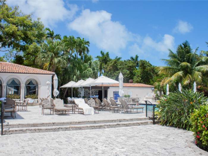 Right next to the mansion is the poolside Beach Club, a collection of outdoor pavilions clustered around a swimming pool. There